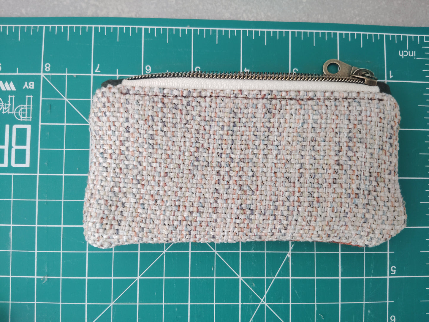 One of a kind series- Zip Pouch- Multiwoven and Orange