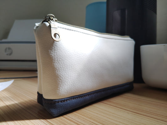One of a kind- Cream/Snow vinyl leather and navy blue canvas Zip Pouch